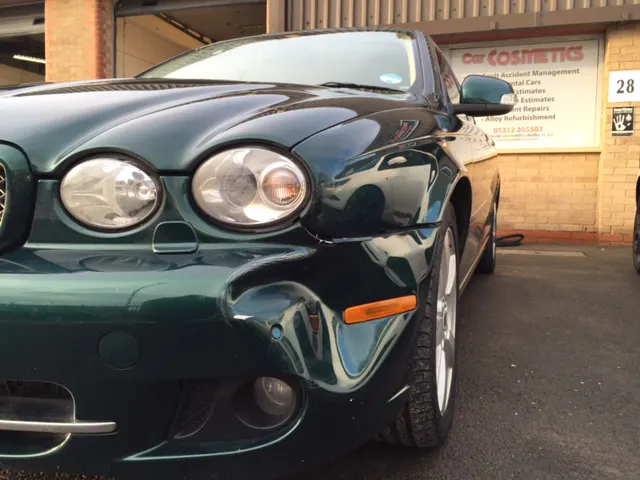 Jaguar X-Type bumper, crushed corner