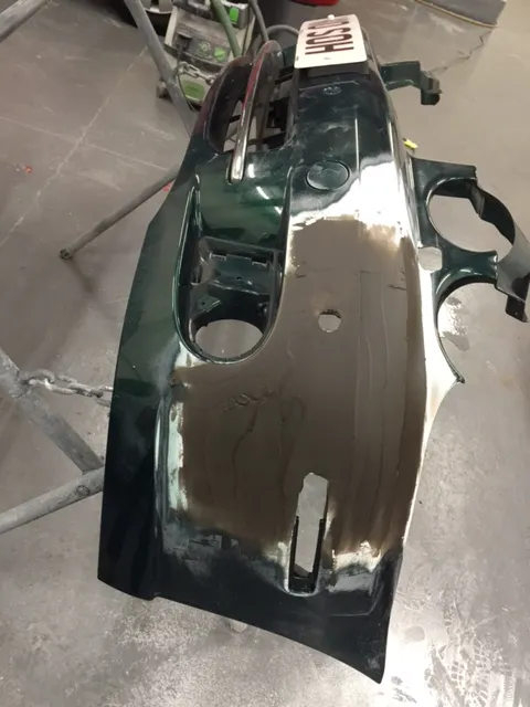 After removing the bumper, we heat treat it from behind to push the bumper out again
