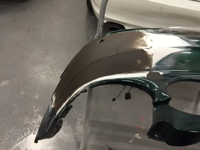We then sand the bumper back so we can repair it