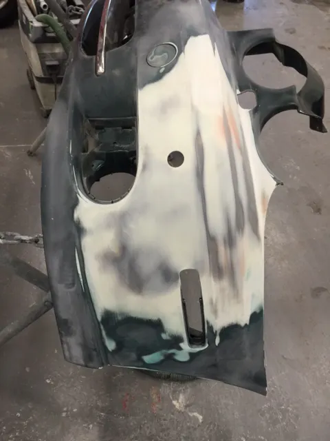 We then apply filler, sand it back into shape, prime and wet flat it again, then send it for paint which we mix on site